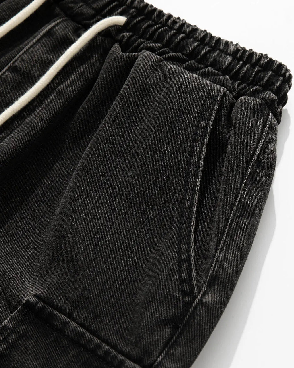 Inflation brand washed denim cargo shorts with drawstring, casual streetwear pants featuring multiple pockets and a relaxed fit.