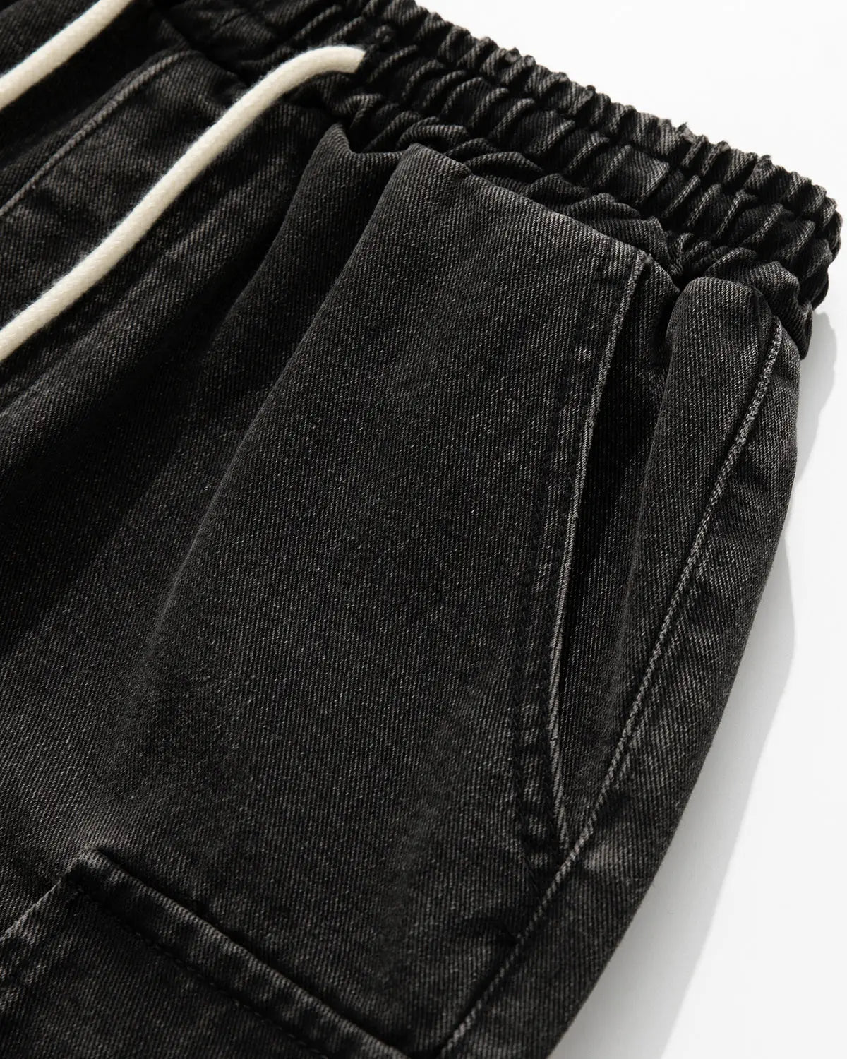 Inflation brand washed denim cargo shorts with drawstring, casual streetwear pants featuring multiple pockets and a relaxed fit.