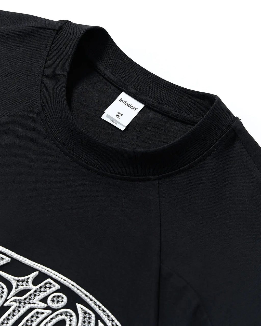 Hollow embroidered graphic T-shirt by INFLATION featuring bold embroidery and streetwear style in a casual fit.
