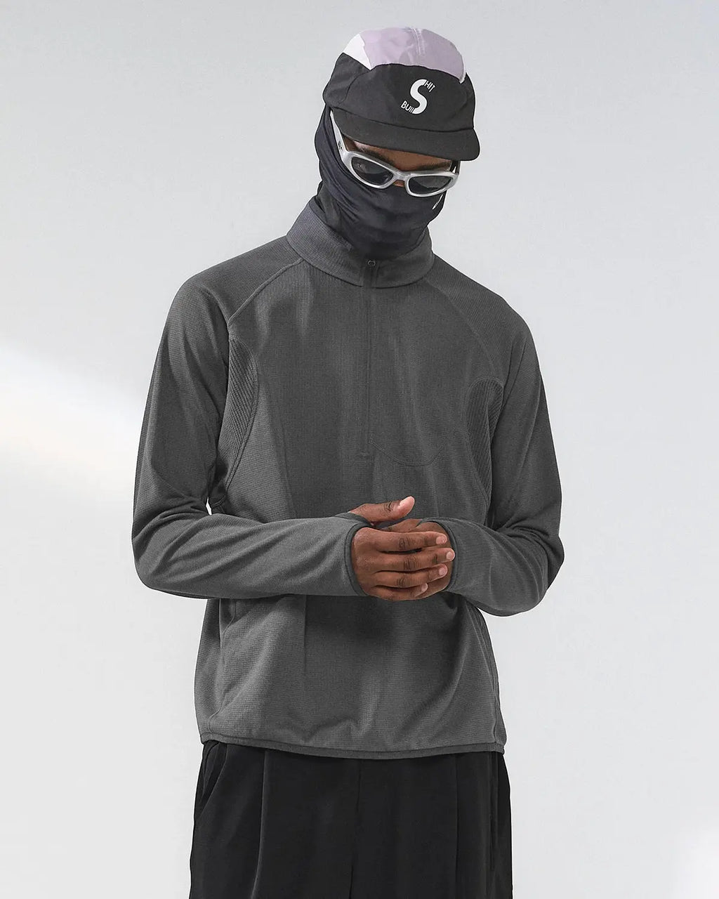Inflation Streetwear breathable grid fleece half-zip sweatshirt in black, showcasing its textured fabric and stylish design.