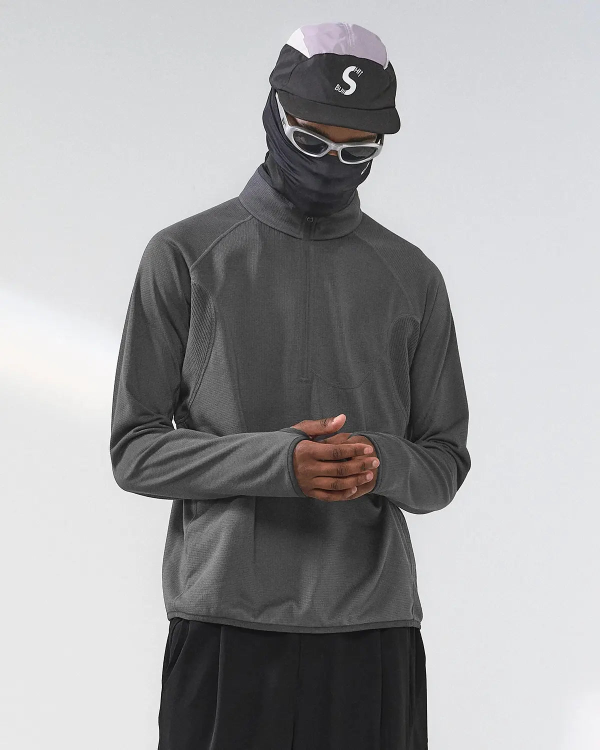 Inflation Streetwear breathable grid fleece half-zip sweatshirt in black, showcasing its textured fabric and stylish design.