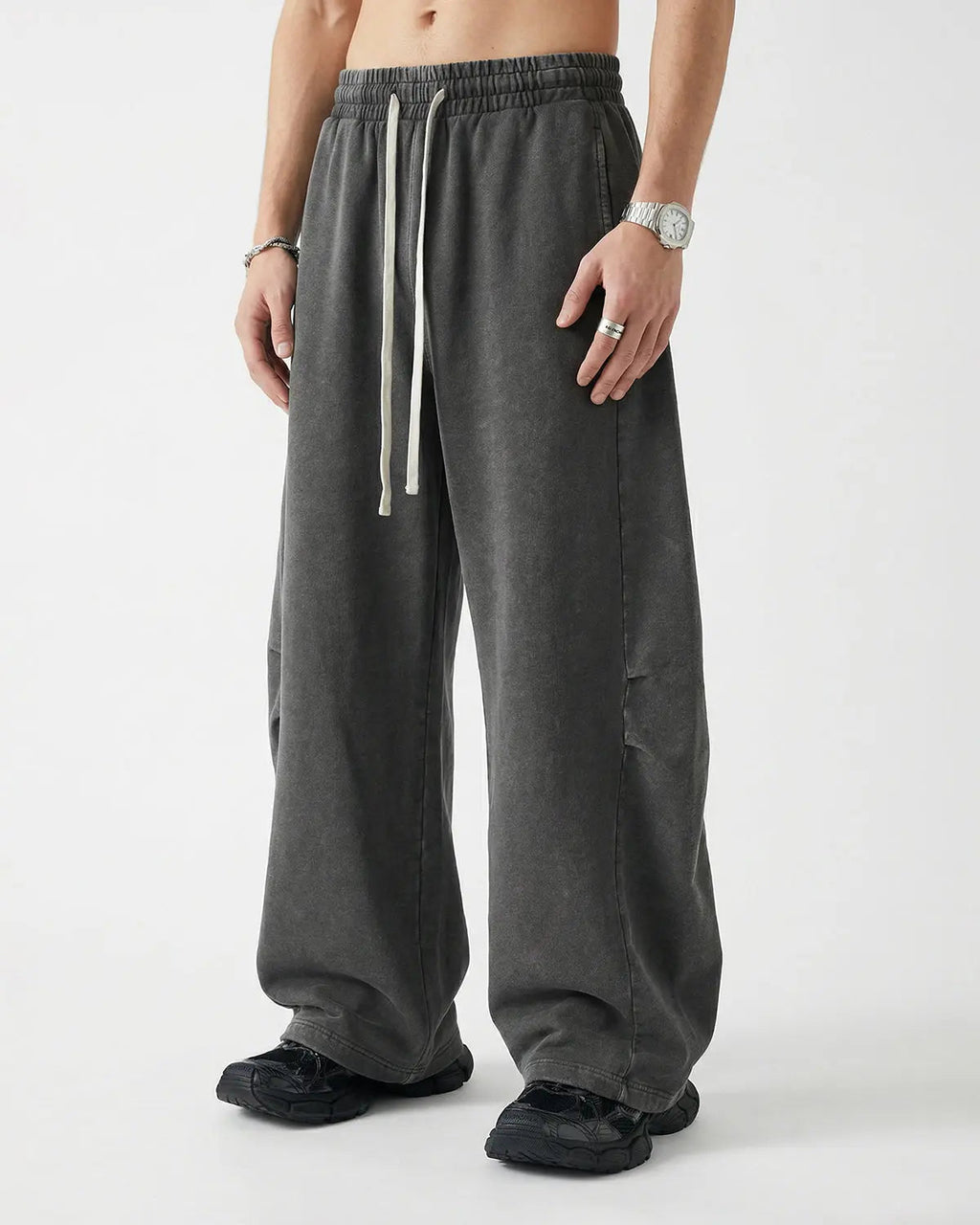 Distressed acid washed barrel sweatpant by INFLATION Streetwear, featuring a relaxed fit and trendy distressed details.