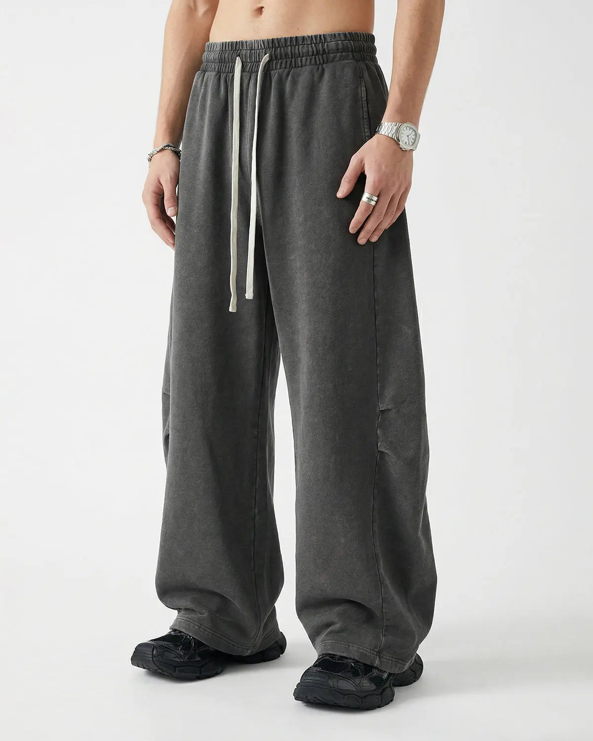 Distressed acid washed barrel sweatpant by INFLATION Streetwear, featuring a relaxed fit and trendy distressed details.