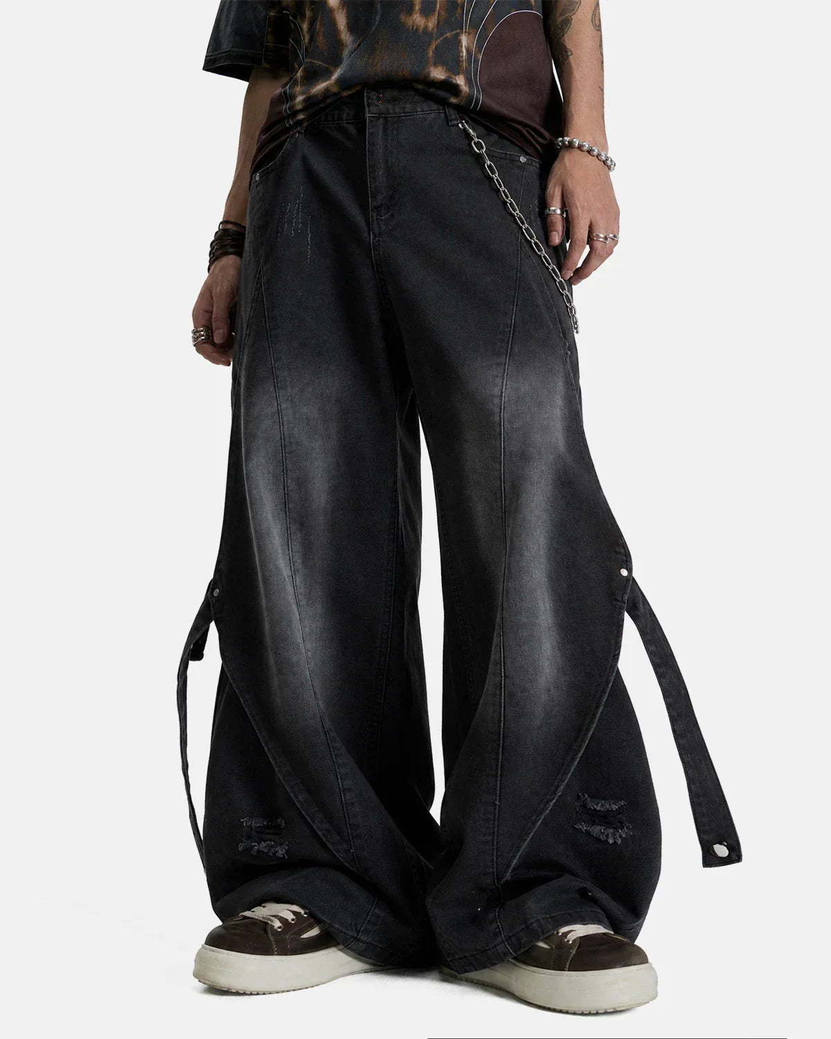 Inflation streetwear washed straight-leg jeans with adjustable straps, showcasing a relaxed fit and distressed denim style.