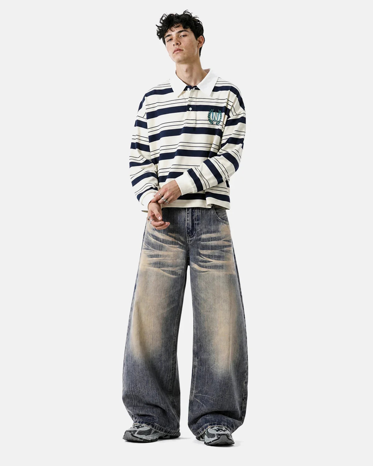 Inflation streetwear bamboo weave dirty wash barrel jeans, featuring distressed denim texture and relaxed fit, front view.
