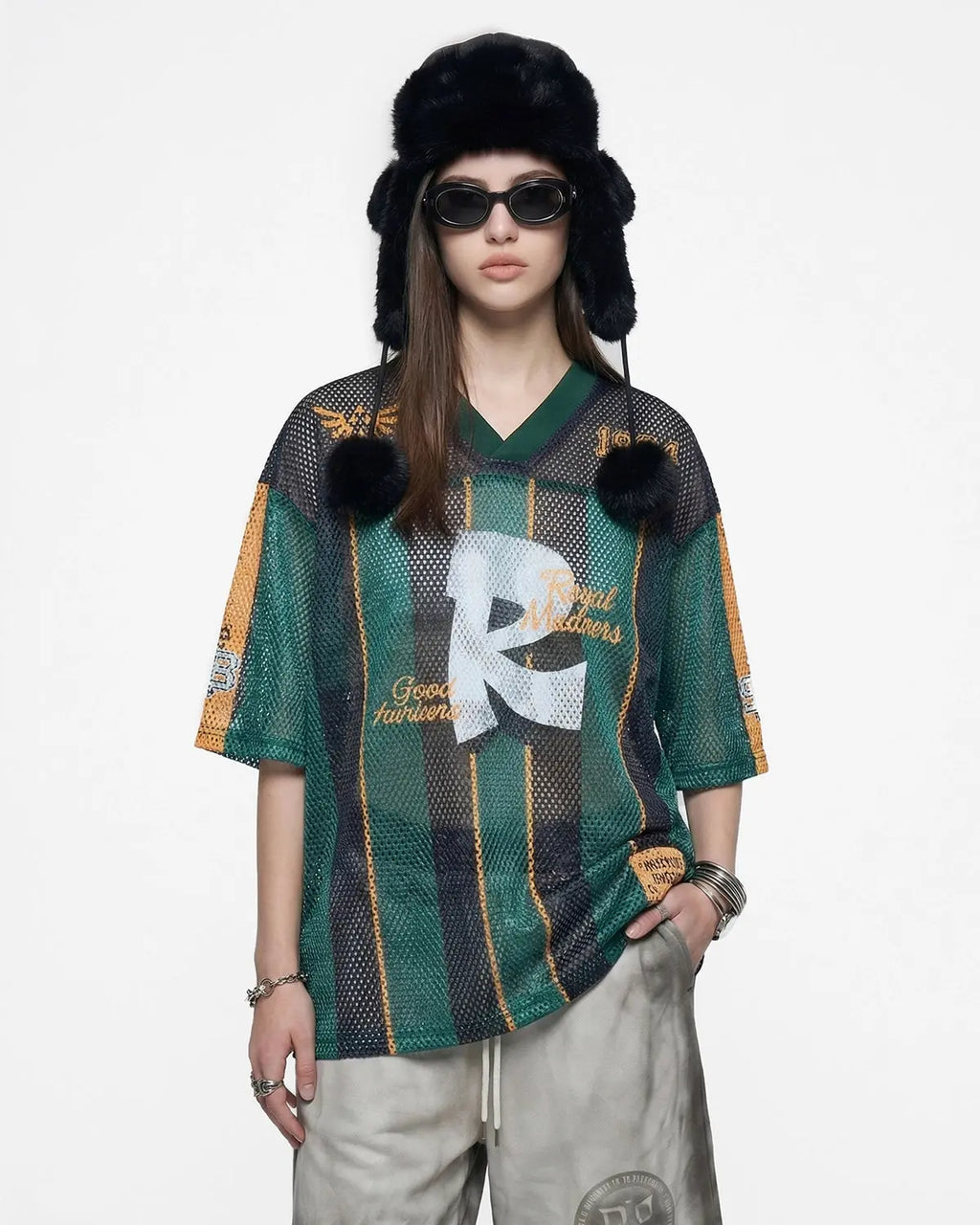 Vintage striped mesh jersey by INFLATION, featuring breathable mesh fabric with colorful horizontal stripes and a relaxed streetwear style.