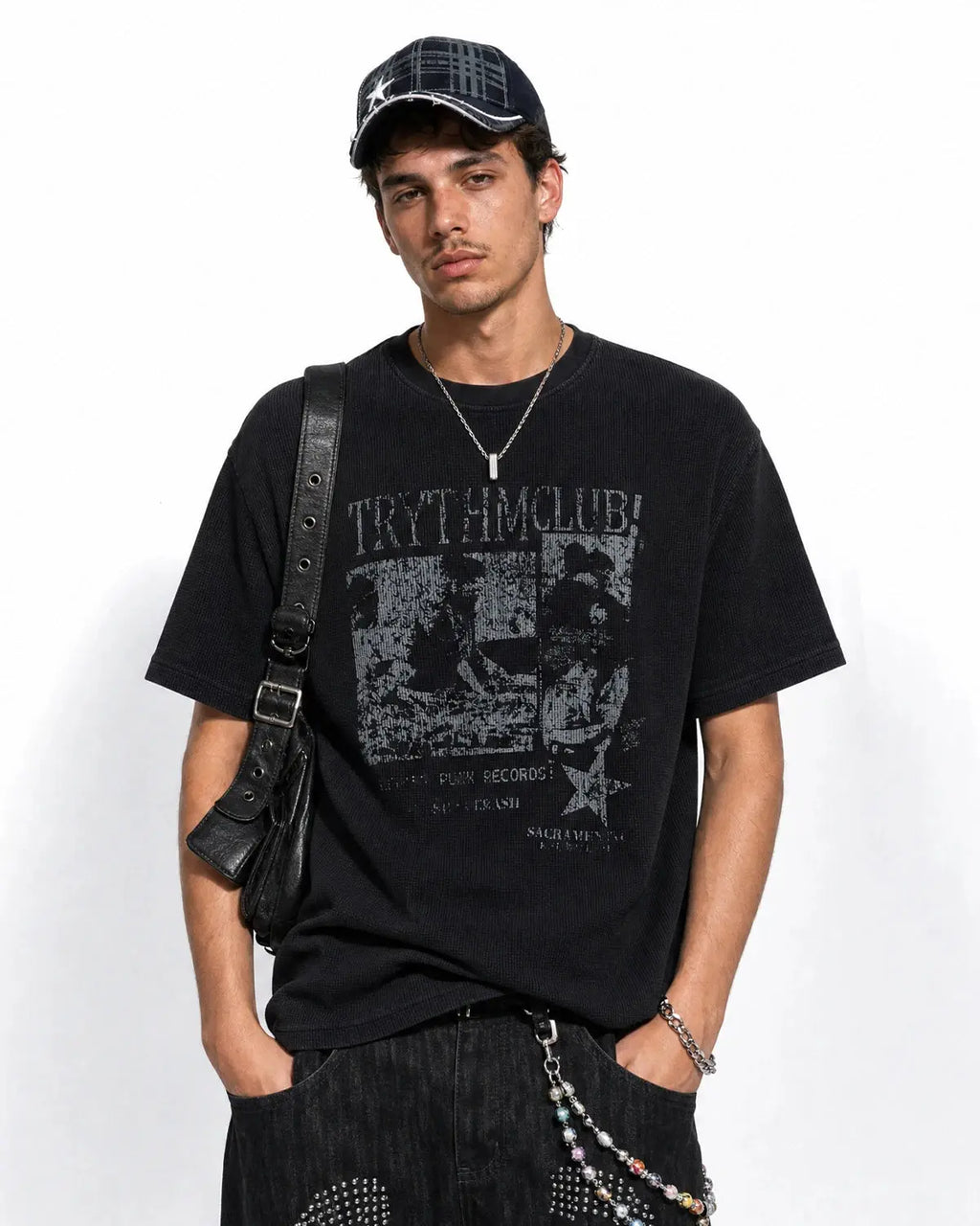 Inflation Streetwear distressed graphic waffle t-shirt featuring bold printed design and relaxed fit, casual streetwear style.