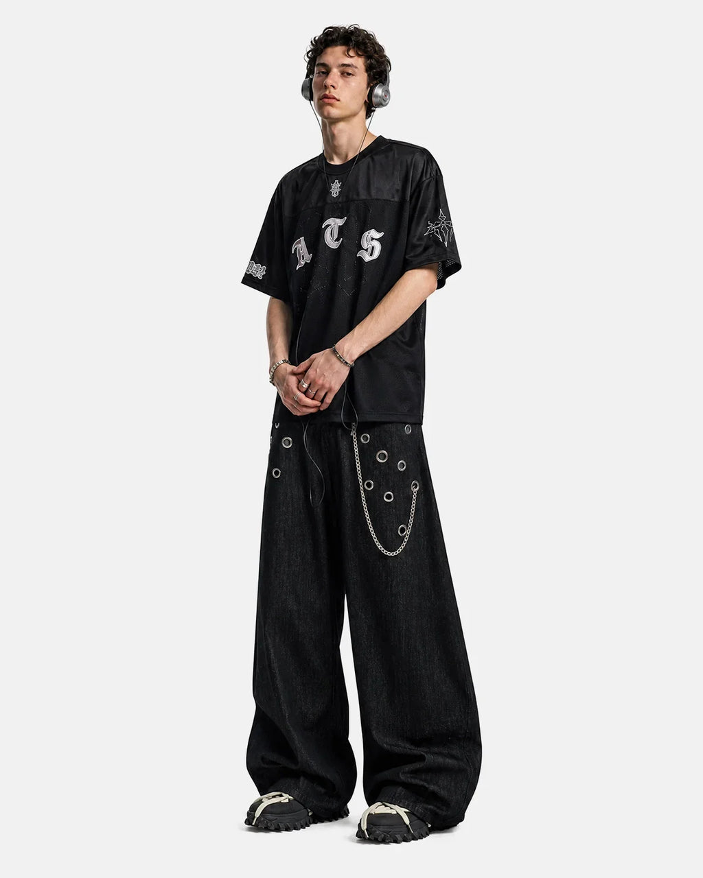 Black gothic embroidered mesh jersey t-shirt by INFLATION, featuring intricate embroidery and sheer mesh fabric for a bold streetwear look.