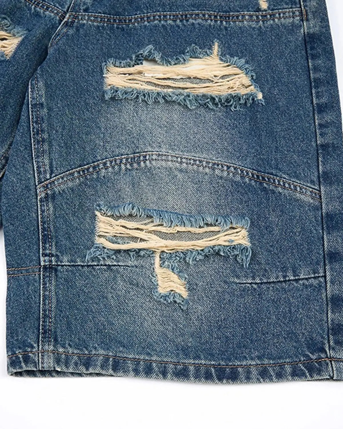 Heavy washed distressed baggy jorts by INFLATION, casual denim pants with ripped details and a relaxed fit.