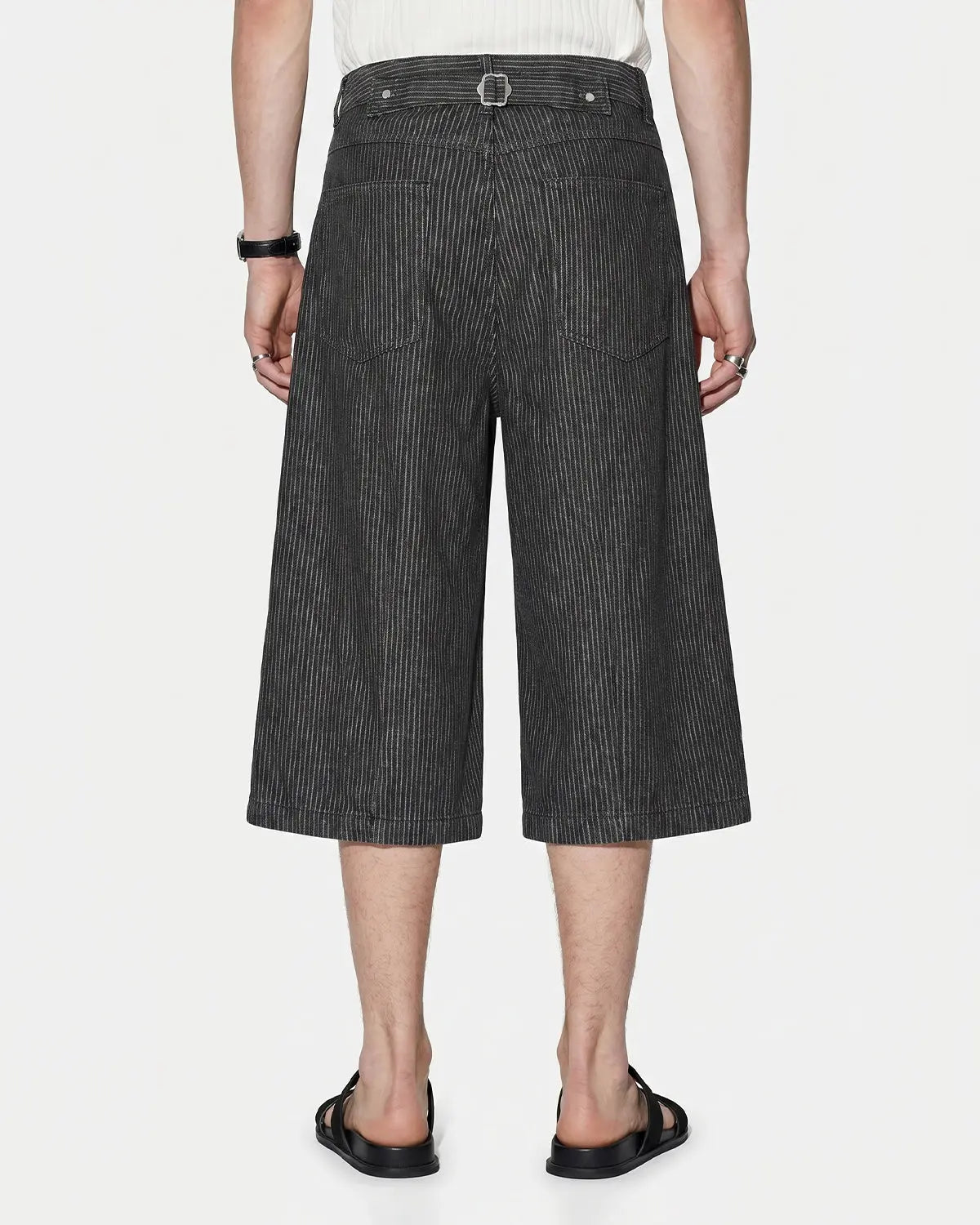 Inflation Streetwear striped button fly baggy jorts pants with red, white, and blue vertical stripes and relaxed fit.