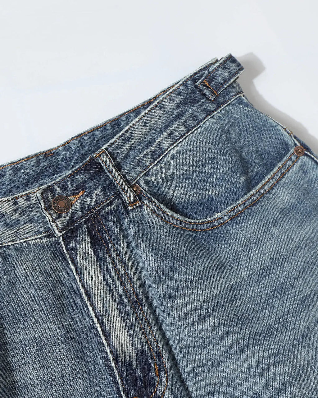 Distressed baggy jorts with adjustable waist tabs from INFLATION, styled as casual streetwear pants with a relaxed fit.