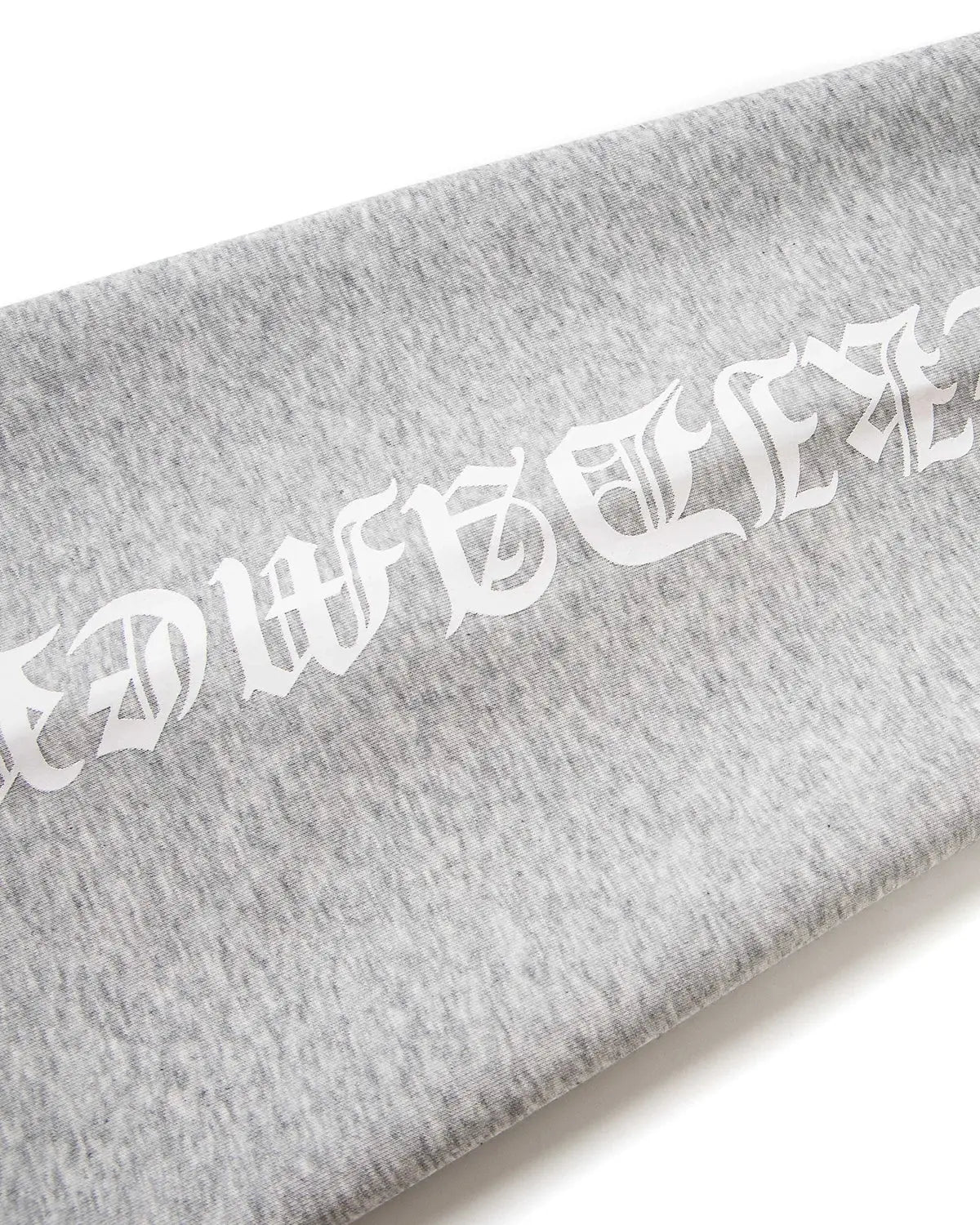 Inflation Cross Print Baggy Sweatpants with bold black cross graphic, relaxed fit, and comfortable streetwear style.