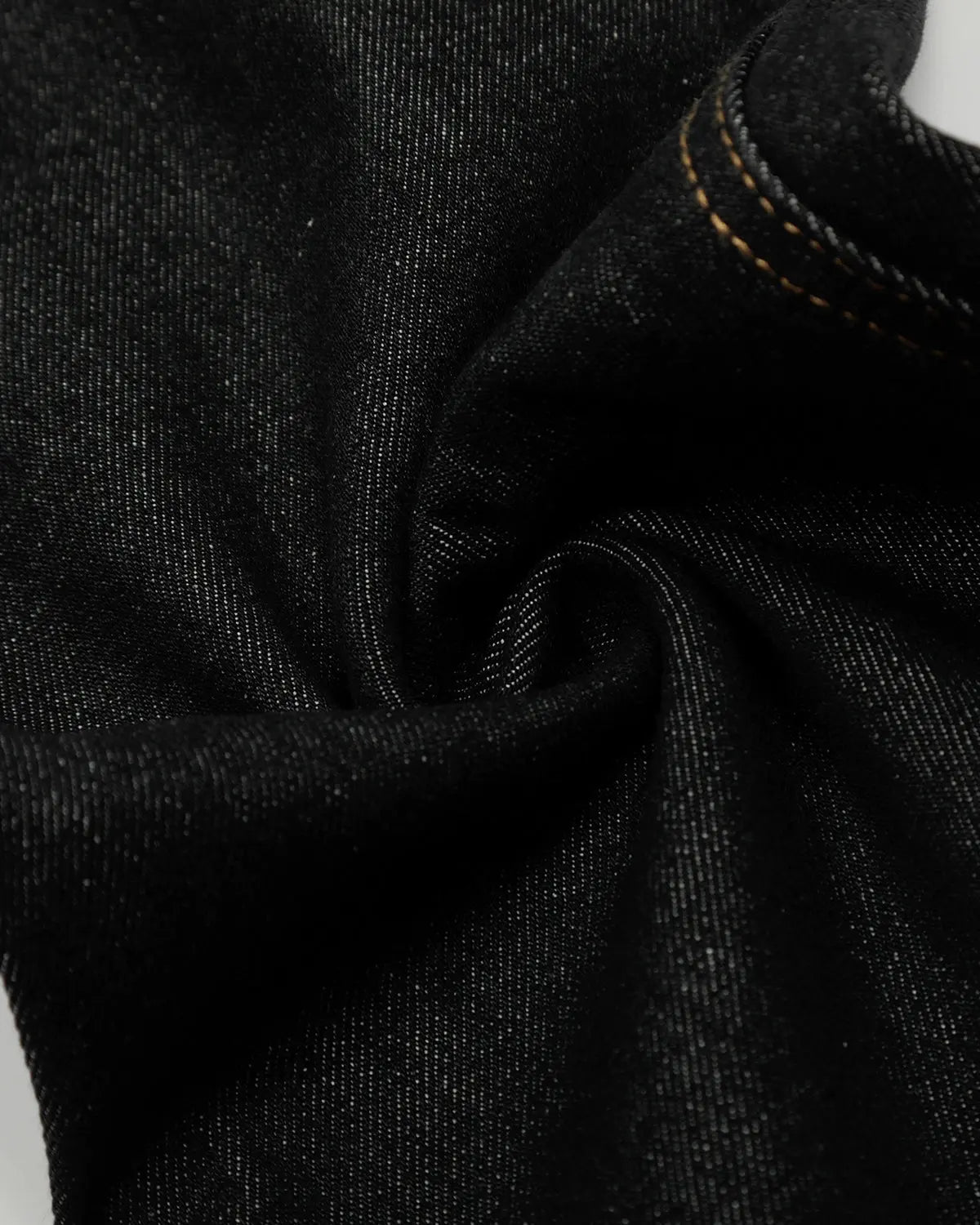Raw Embroidery Baggy Jeans by INFLATION featuring distressed denim, loose fit, and raw embroidery details on the streetwear style jeans.