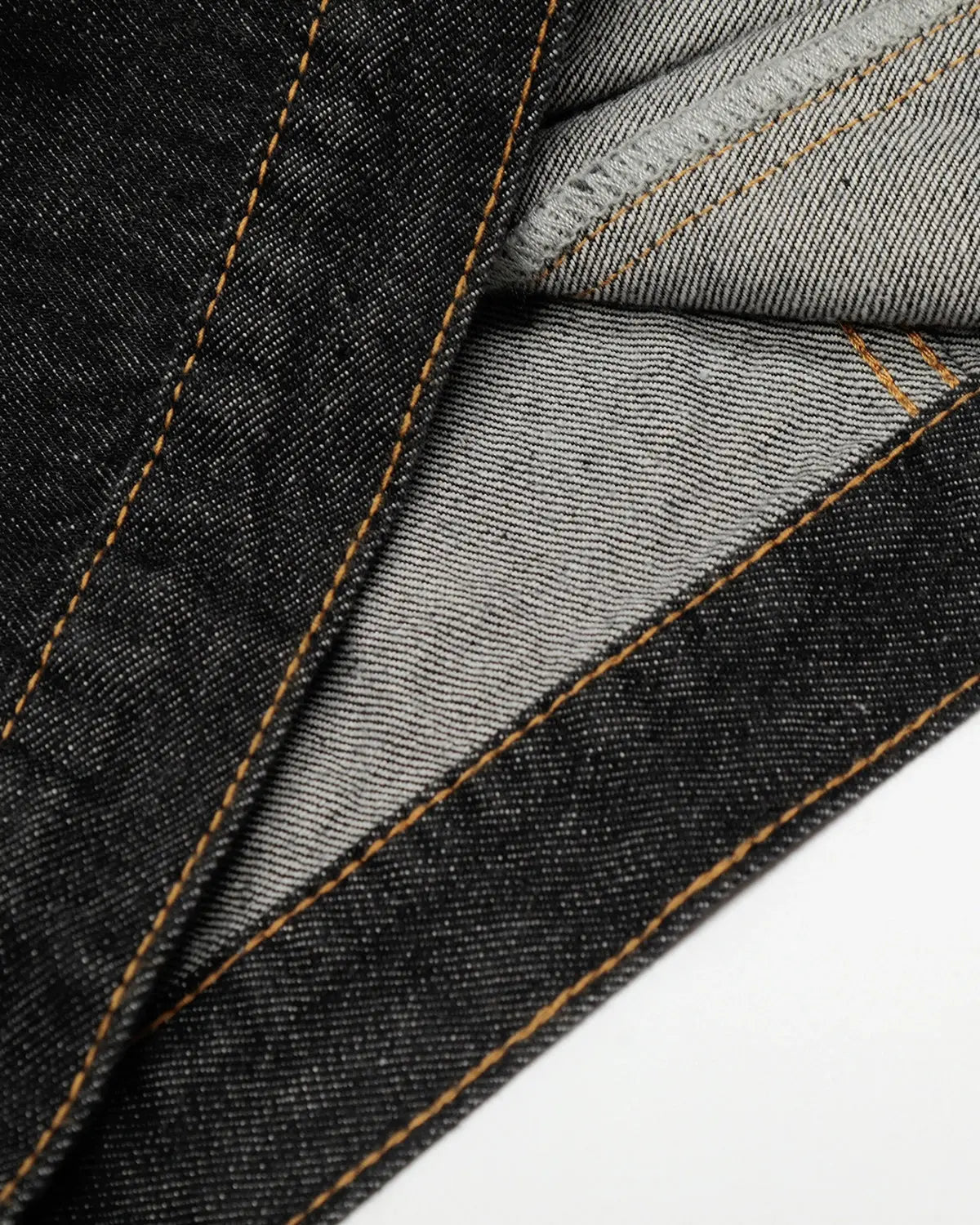 Black multi-pockets denim jacket by INFLATION with stylish streetwear design and functional pockets, close-up view of the jacket.