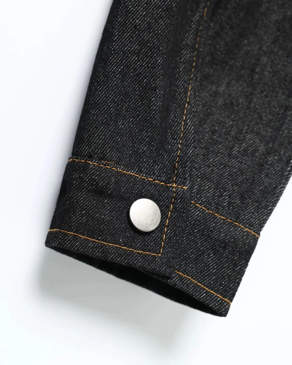 Metal toggle raw denim jacket from Inflation Streetwear, featuring classic raw denim fabric and metal button details.