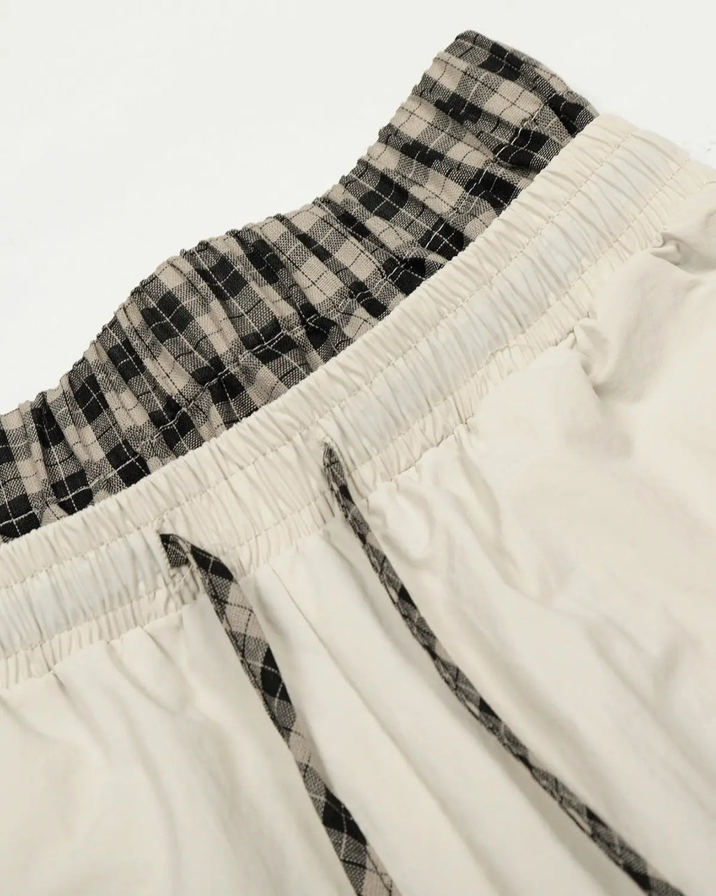 Inflation Streetwear plaid double waist baggy track pants with relaxed fit and adjustable waistband, casual streetwear style.