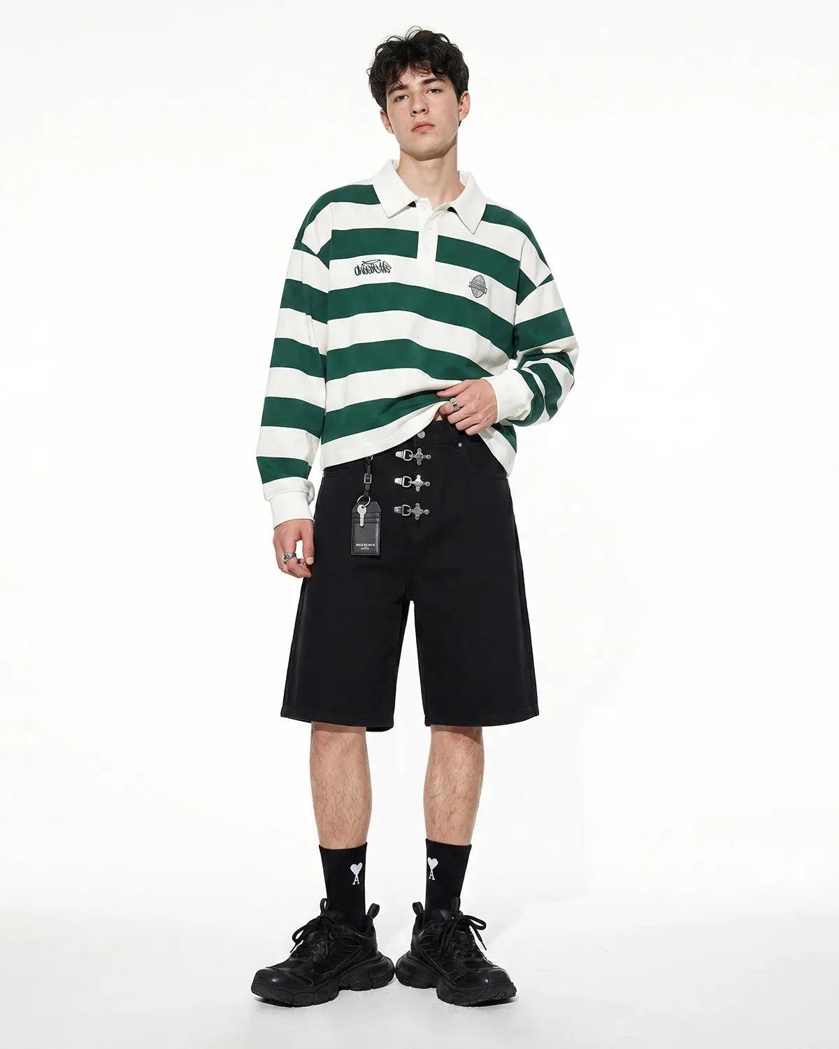 Metal clasp baggy jorts from INFLATION streetwear with distressed denim, relaxed fit, and metal hardware details.