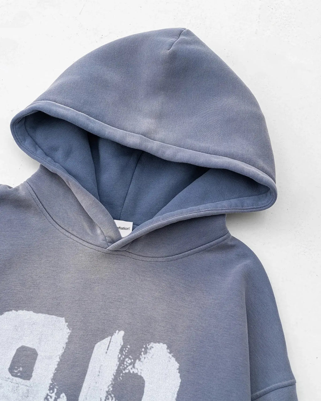 Inflation Streetwear graffiti print washed fleece hoodie showing colorful graffiti design on soft fabric.
