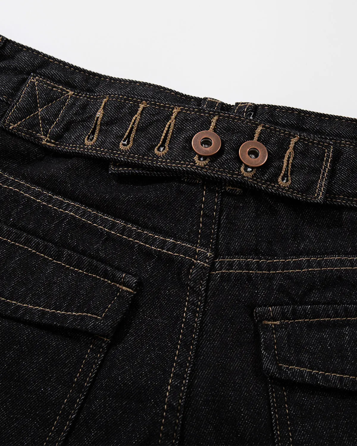 Raw denim longline cargo jorts by INFLATION featuring distressed details and multiple cargo pockets for a streetwear look.