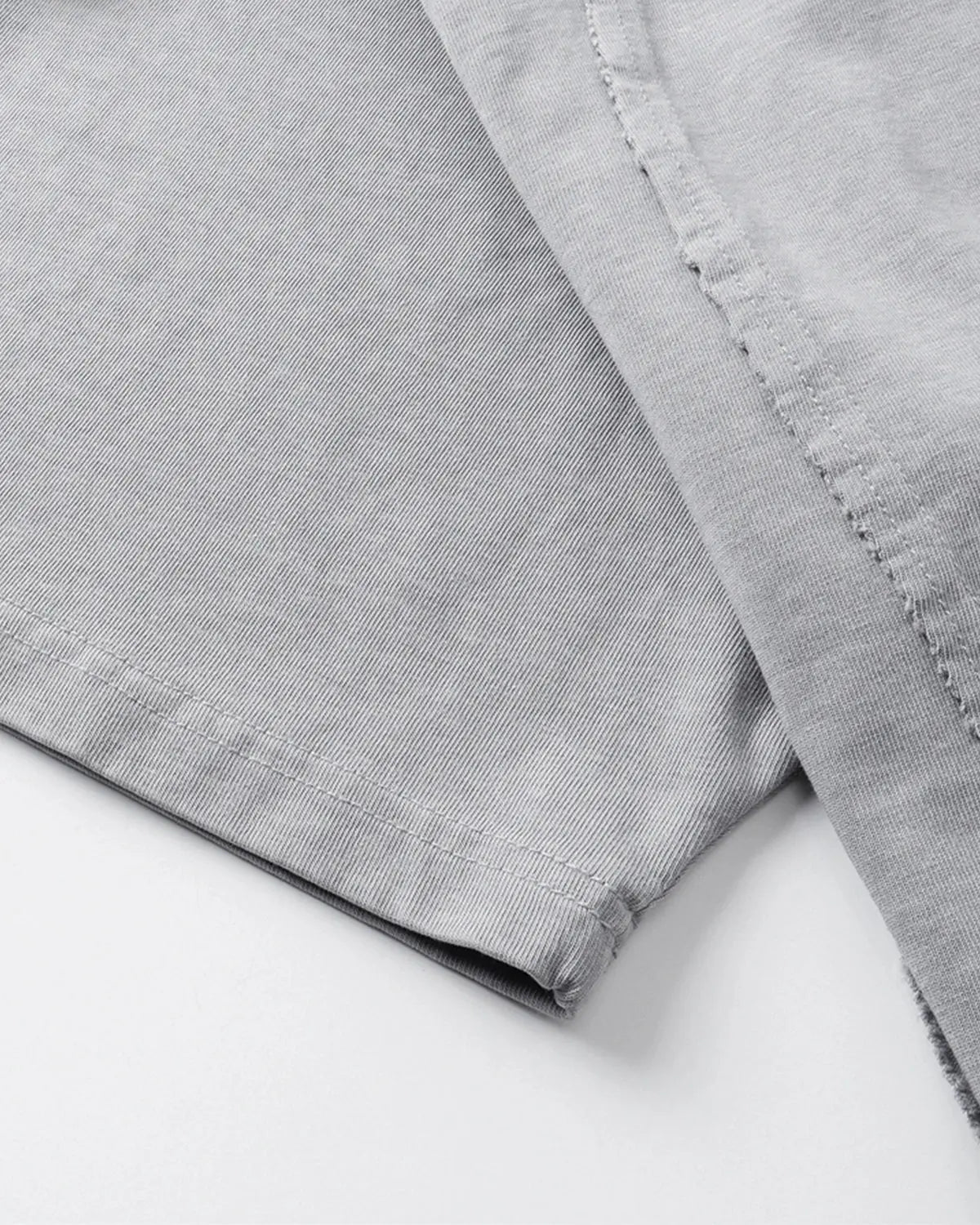 Acid wash boxy fit T-shirt by INFLATION featuring a relaxed, oversized streetwear style in light and dark wash denim tones.
