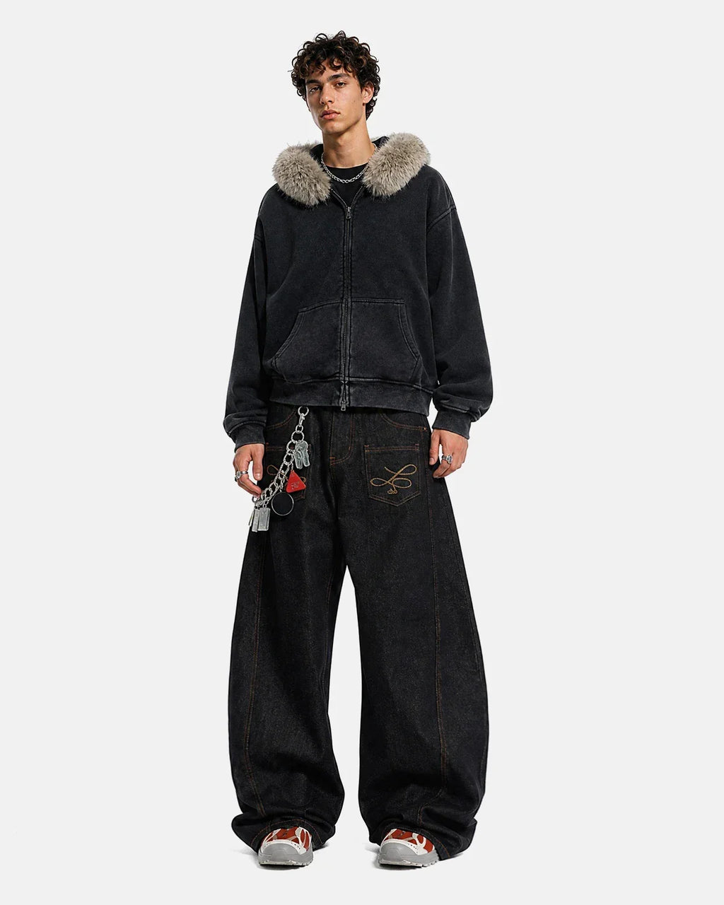 Inflation Streetwear faux fur collar distressed zip-up hoodie showing a black hoodie with a fur-lined collar and distressed details.