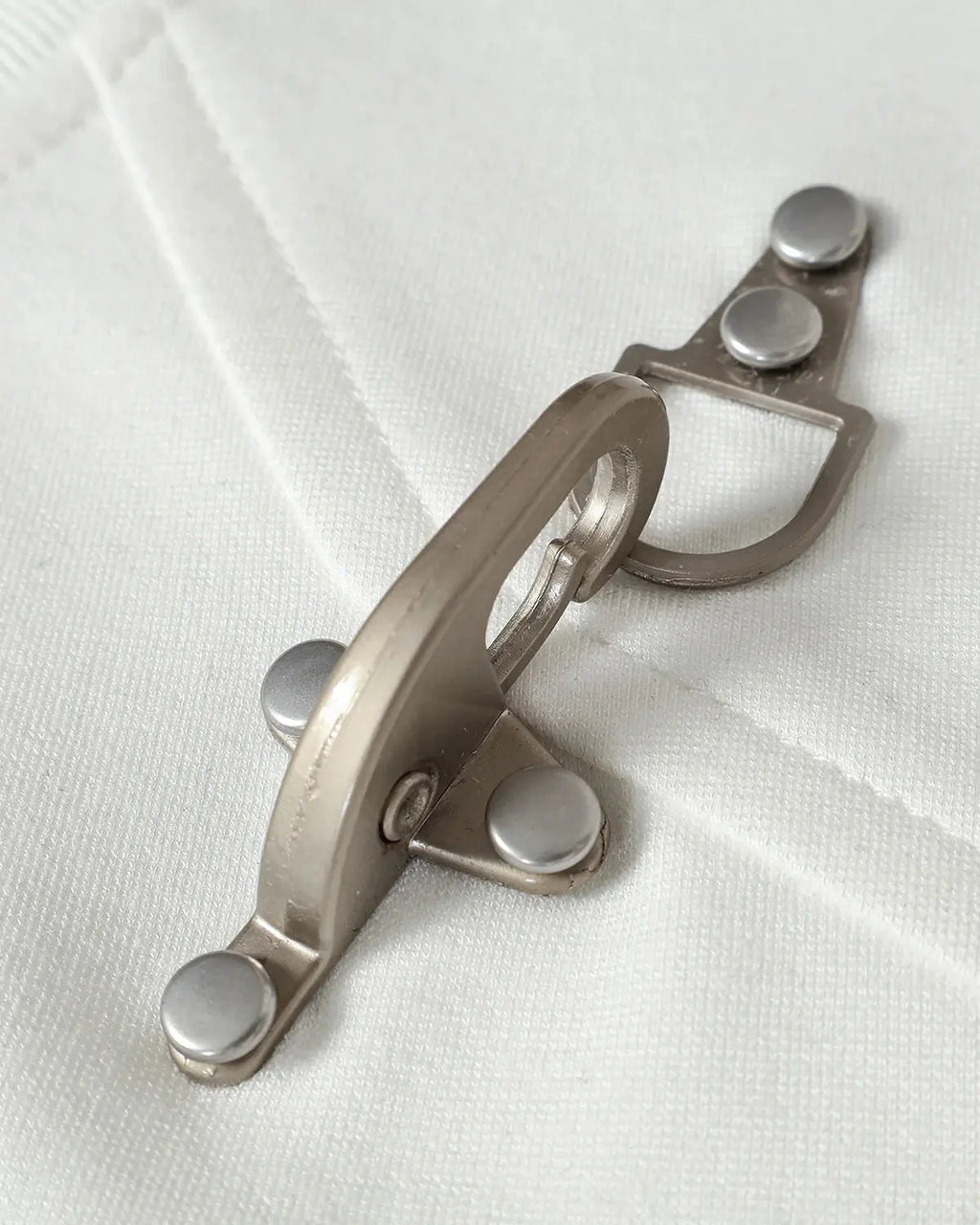 Inflation Streetwear cotton T-shirt featuring metal buckle detail, casual fit, and minimalist design in neutral colors.
