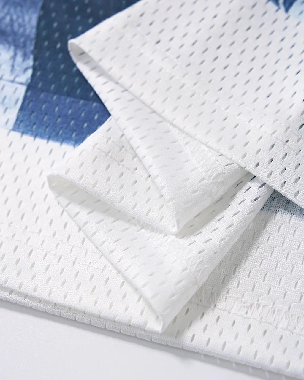 Digital printing mesh jersey T-shirt by INFLATION, featuring a stylish streetwear design with breathable mesh fabric.
