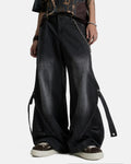 Light blue washed straight-leg jeans with adjustable straps from Inflation Streetwear, displayed on a hanger against a neutral background.
