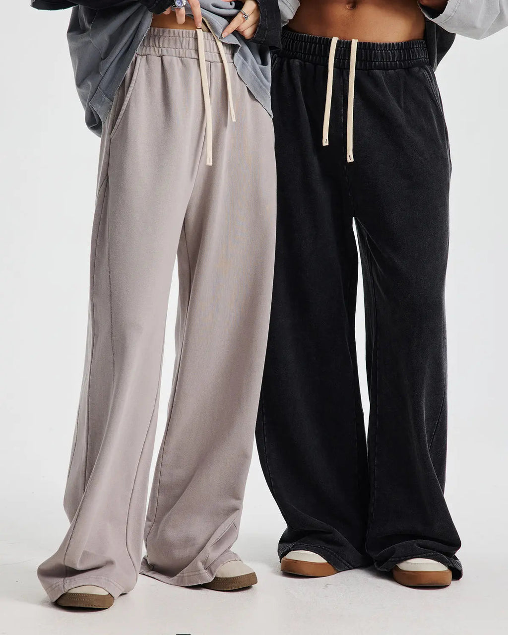 Inflation Streetwear acid wash straight leg sweatpants with stitching detail, made from comfortable casual pants fabric.