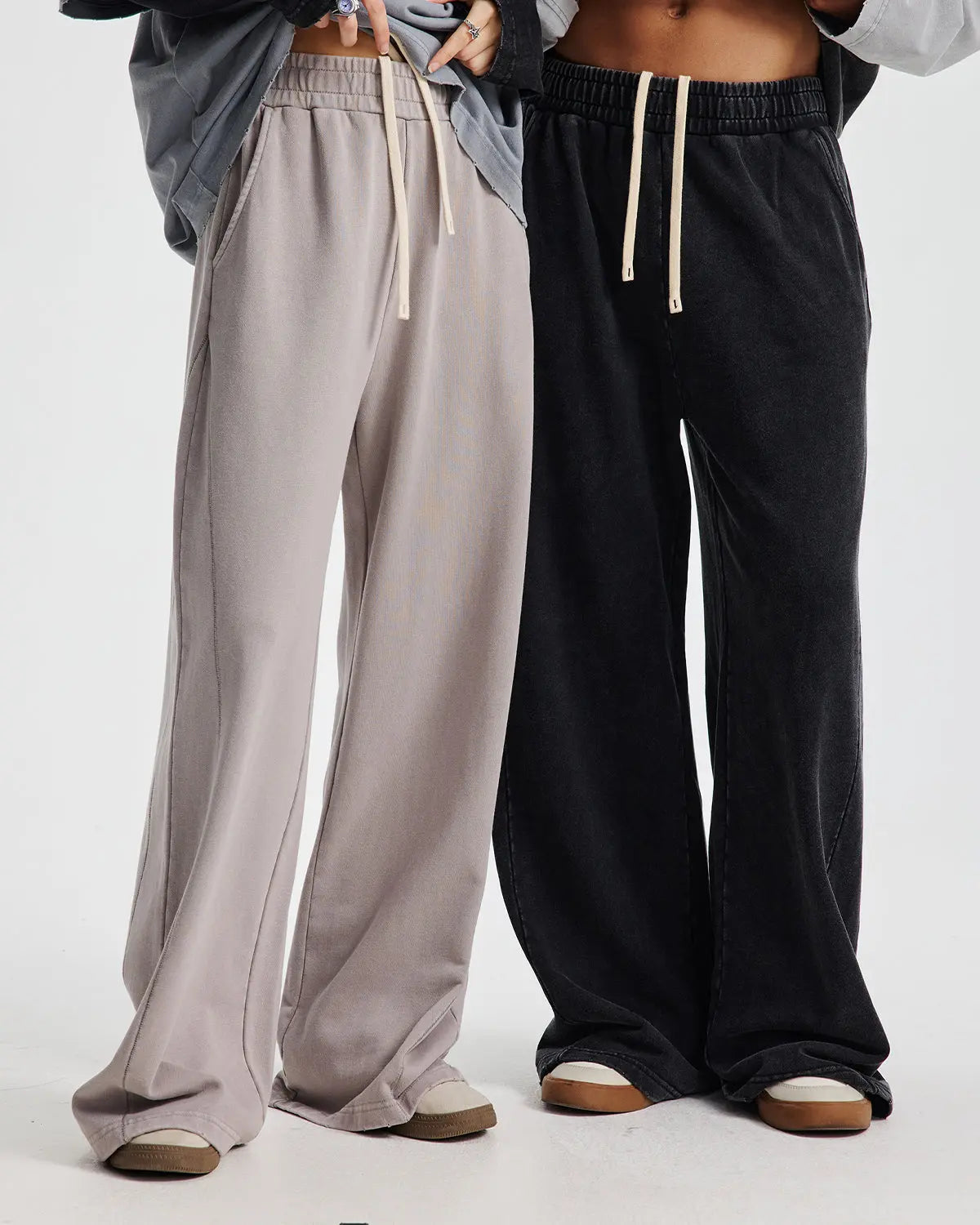 Inflation Streetwear acid wash straight leg sweatpants with stitching detail, made from comfortable casual pants fabric.