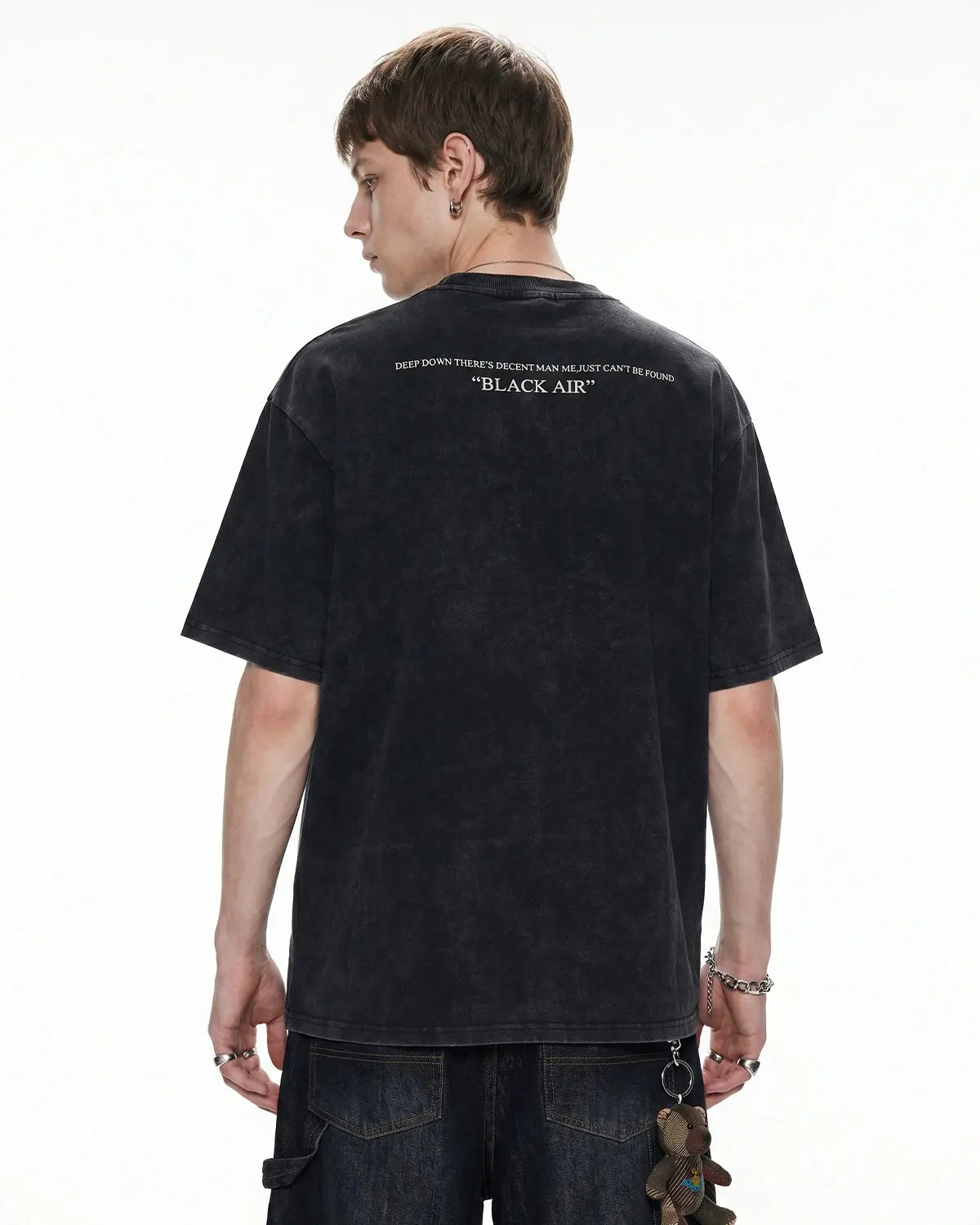 Washed graphic oversized T-shirt by INFLATION with bold print, relaxed fit, and streetwear style featuring colorful design.