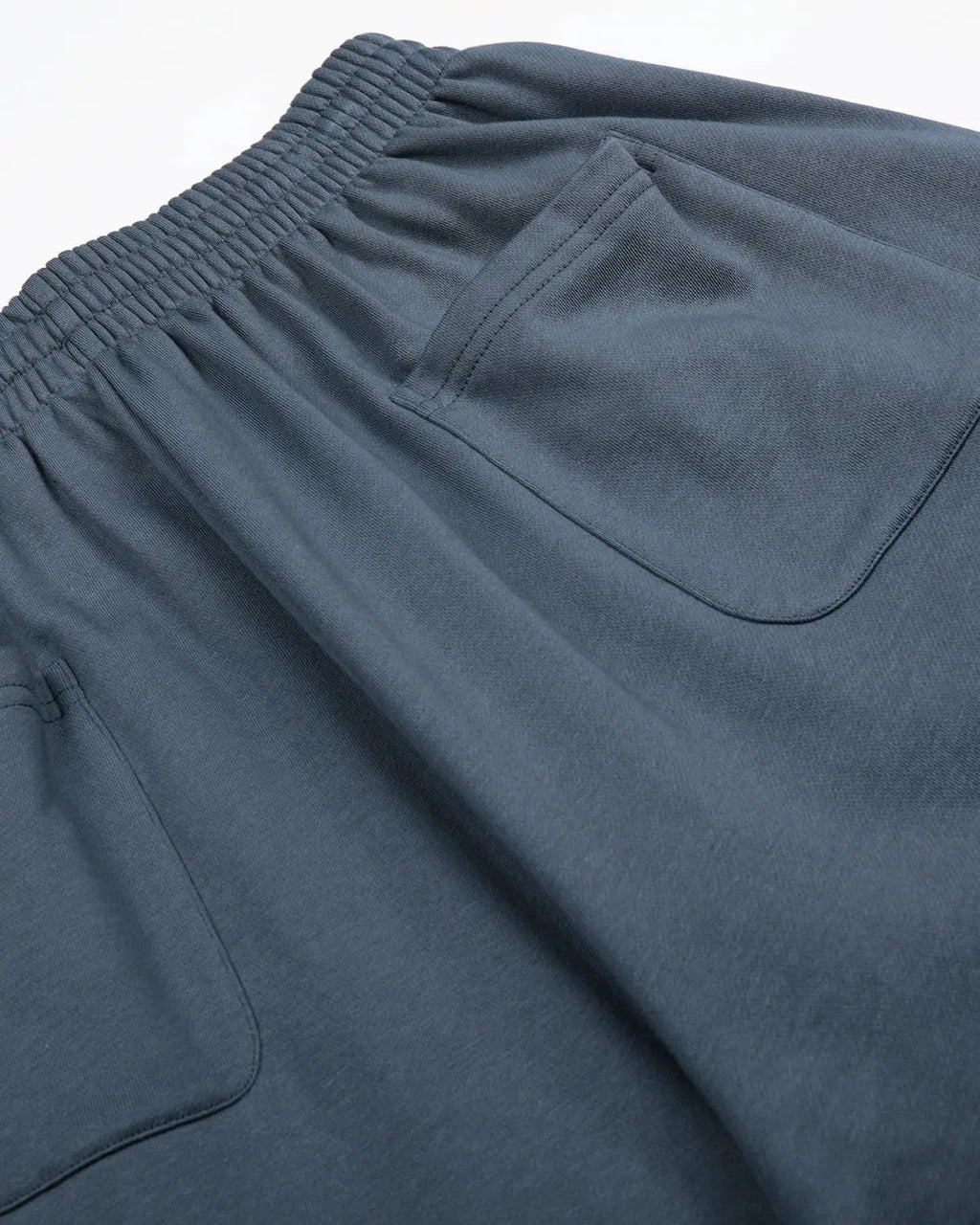 Star patch baggy wide-leg sweatpants from INFLATION Streetwear, showing the relaxed fit and star patch details on soft fabric.