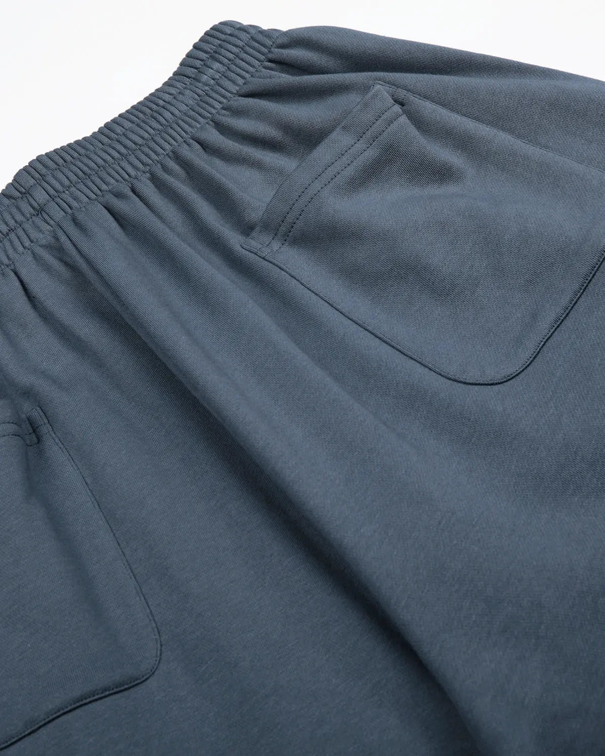 Star patch baggy wide-leg sweatpants from INFLATION Streetwear, showing the relaxed fit and star patch details on soft fabric.