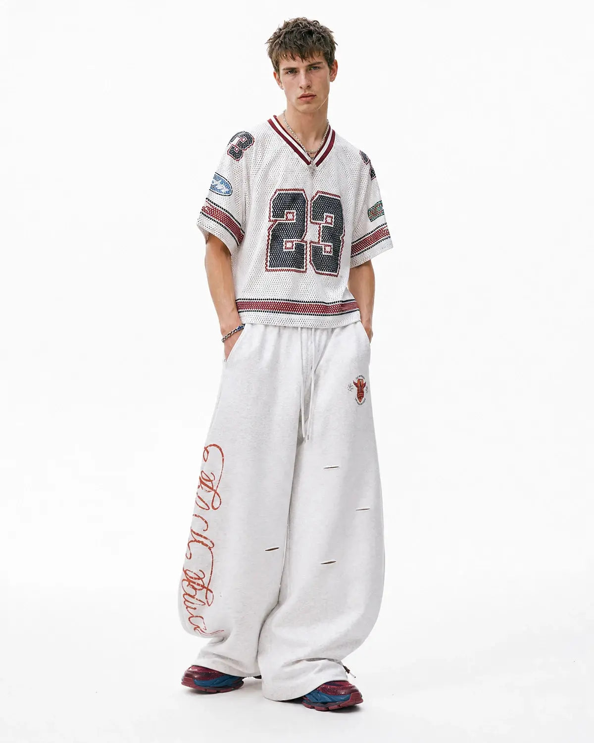 Vintage Washed Barrel Sweatpants by INFLATION Streetwear, relaxed fit with distressed denim look and casual style.