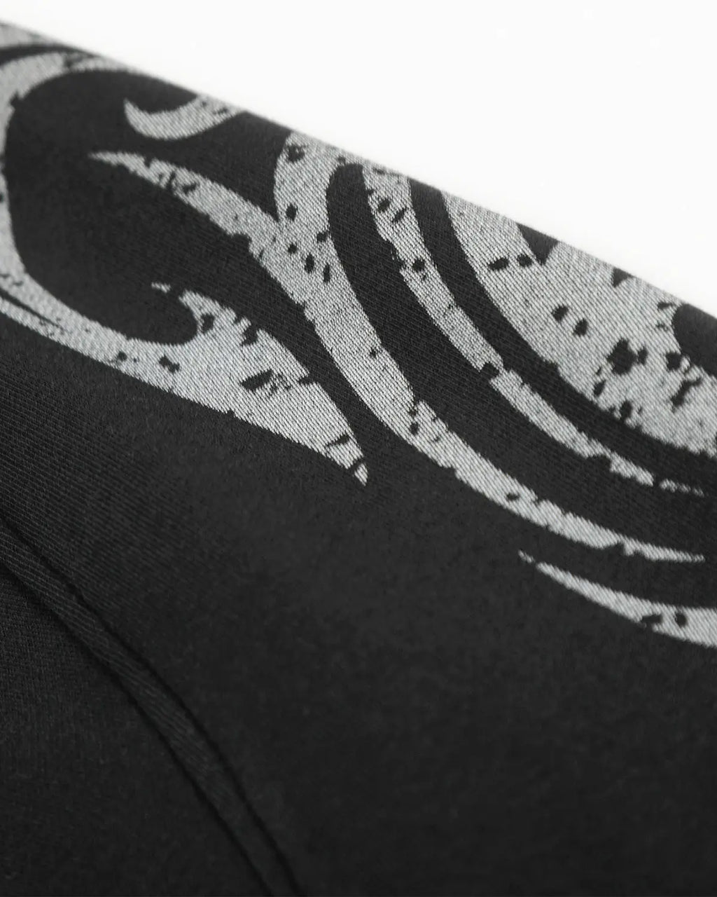 Washed distressed barrel sweatpants by INFLATION Streetwear with a relaxed fit and faded, worn-in design.
