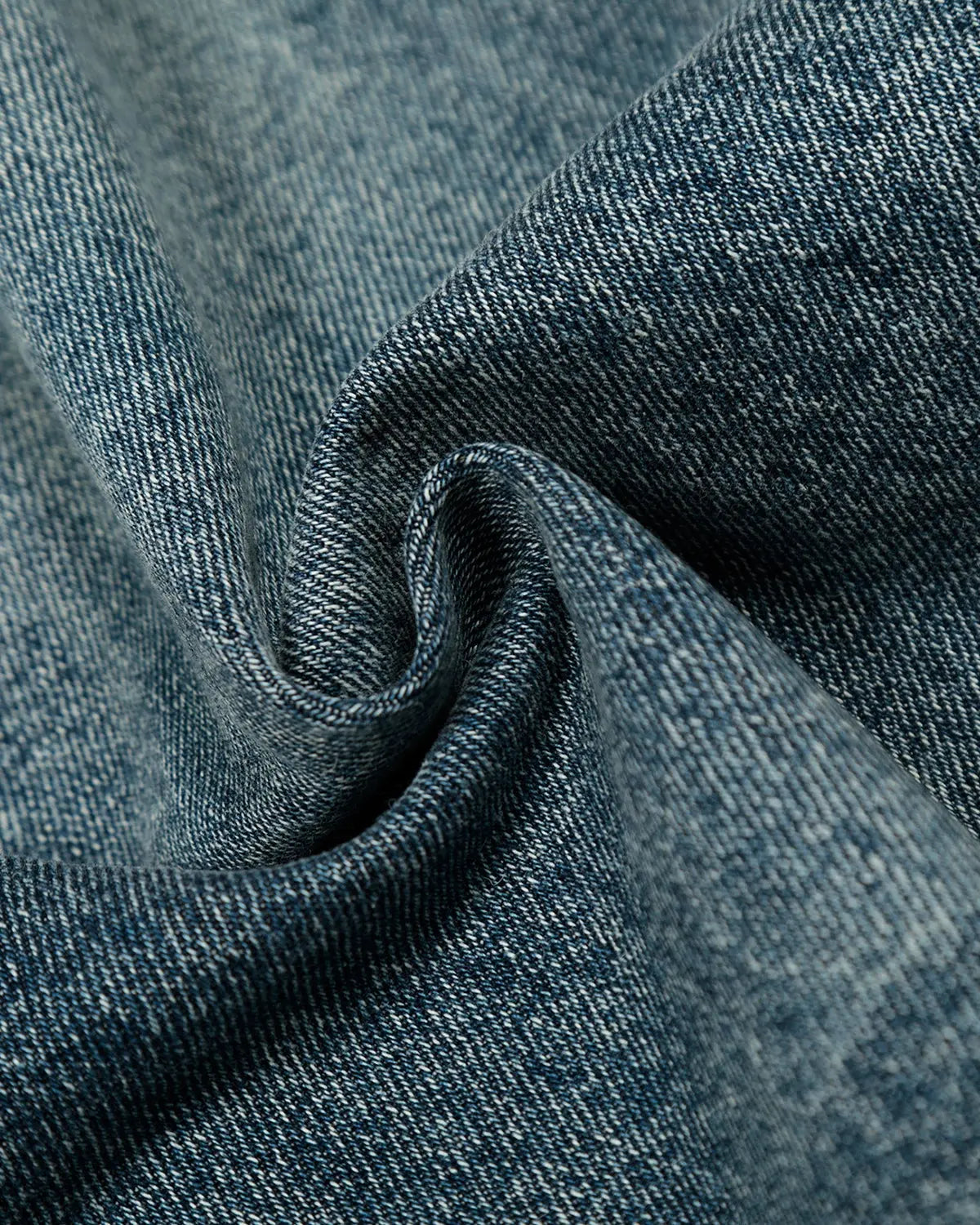 Inflation Whisker Acid Washed Barrel Jeans with distressed detailing and relaxed fit, shown on a model.