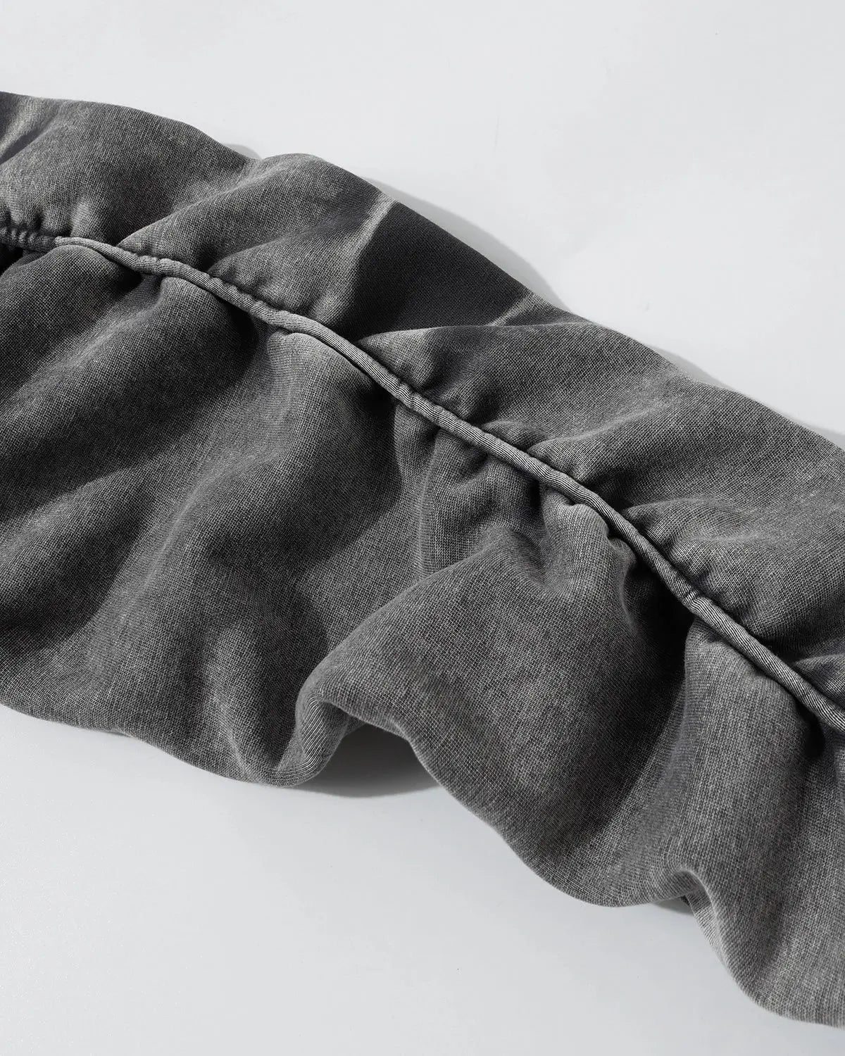 Acid washed embroidery zip-up hoodie by INFLATION Streetwear featuring distressed fabric and embroidered details.