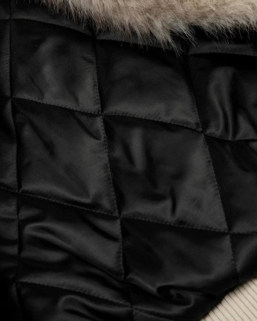 INFLATION Slanted Clasp Fireman Padded Jacket with sturdy design and padded construction, stylish streetwear for cold weather.