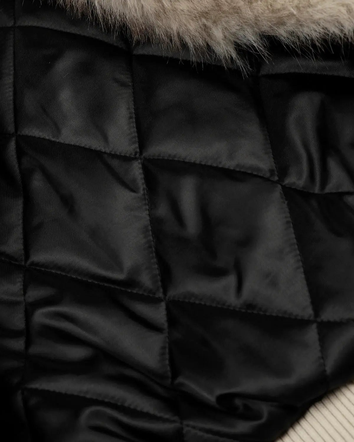 INFLATION Slanted Clasp Fireman Padded Jacket with sturdy design and padded construction, stylish streetwear for cold weather.