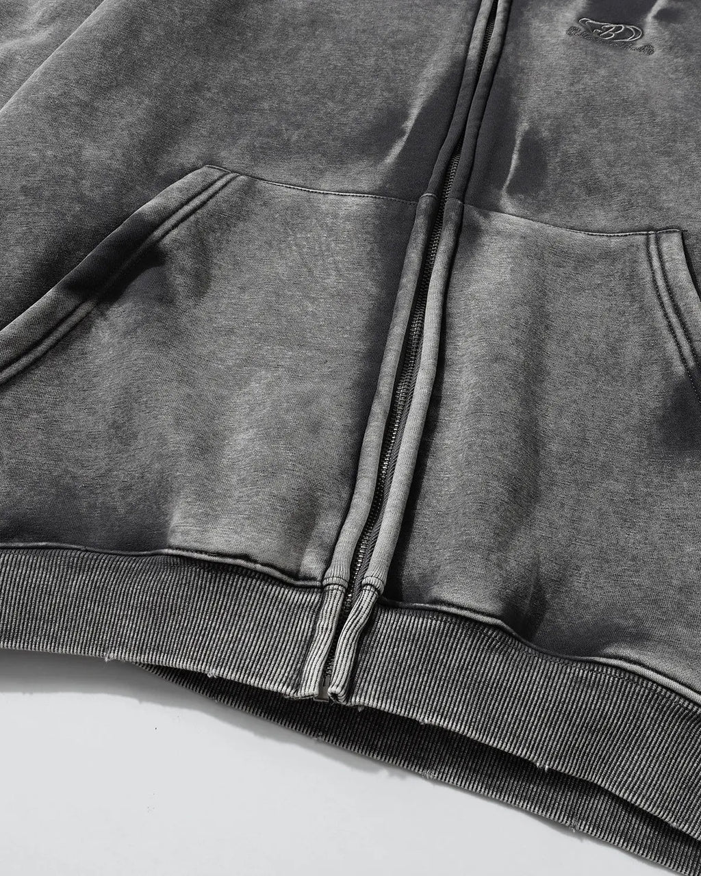 Acid washed embroidery zip-up hoodie by INFLATION Streetwear featuring embroidered details and a casual, trendy fit.