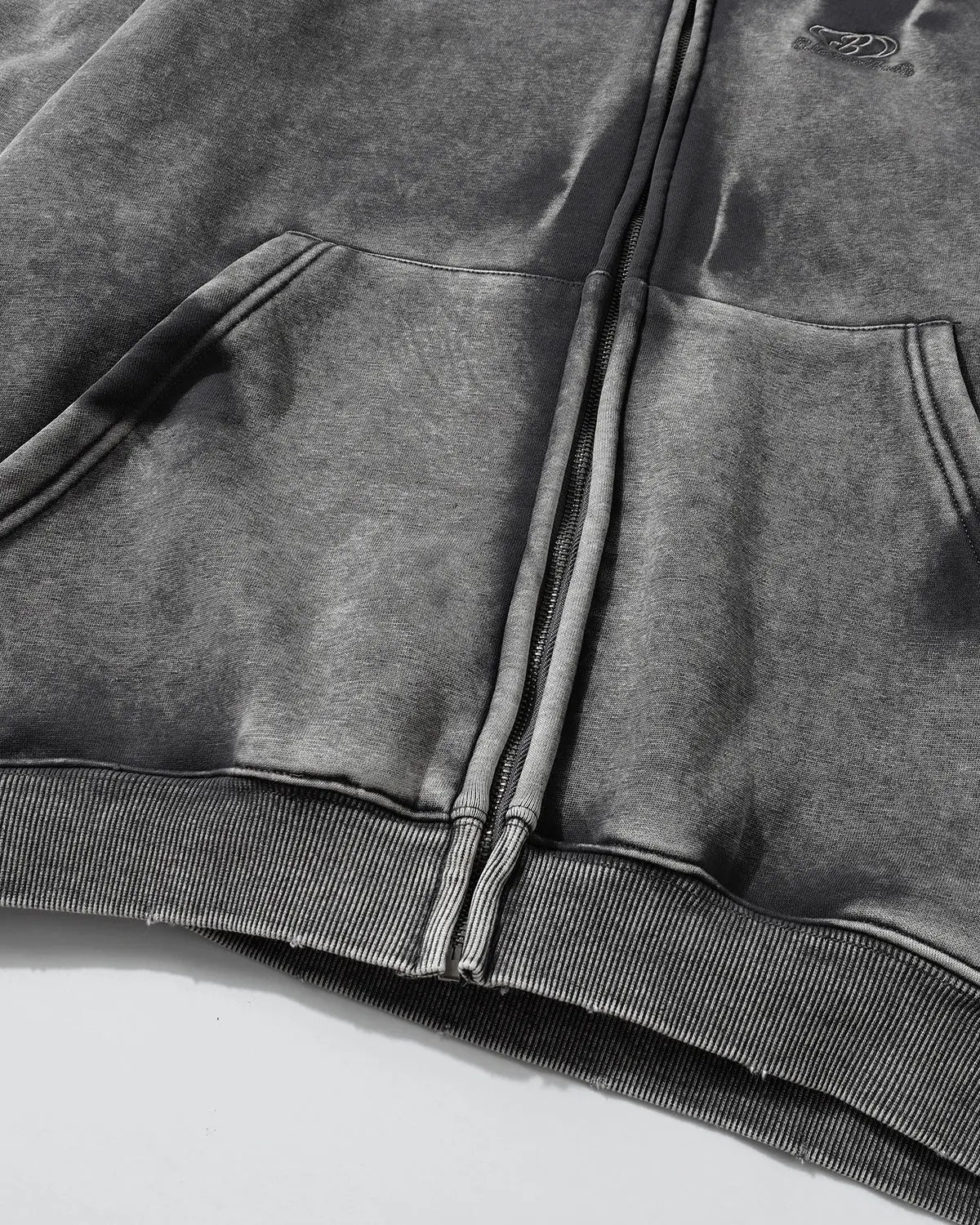 Acid washed embroidery zip-up hoodie by INFLATION Streetwear featuring embroidered details and a casual, trendy fit.