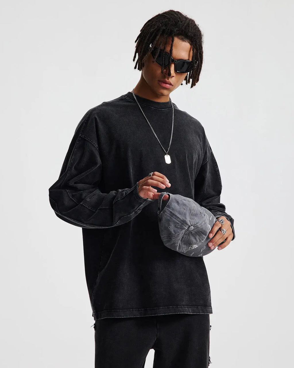 Inflation streetwear distressed acid wash oversized long sleeve tee, featuring a faded, vintage-inspired design and relaxed fit.