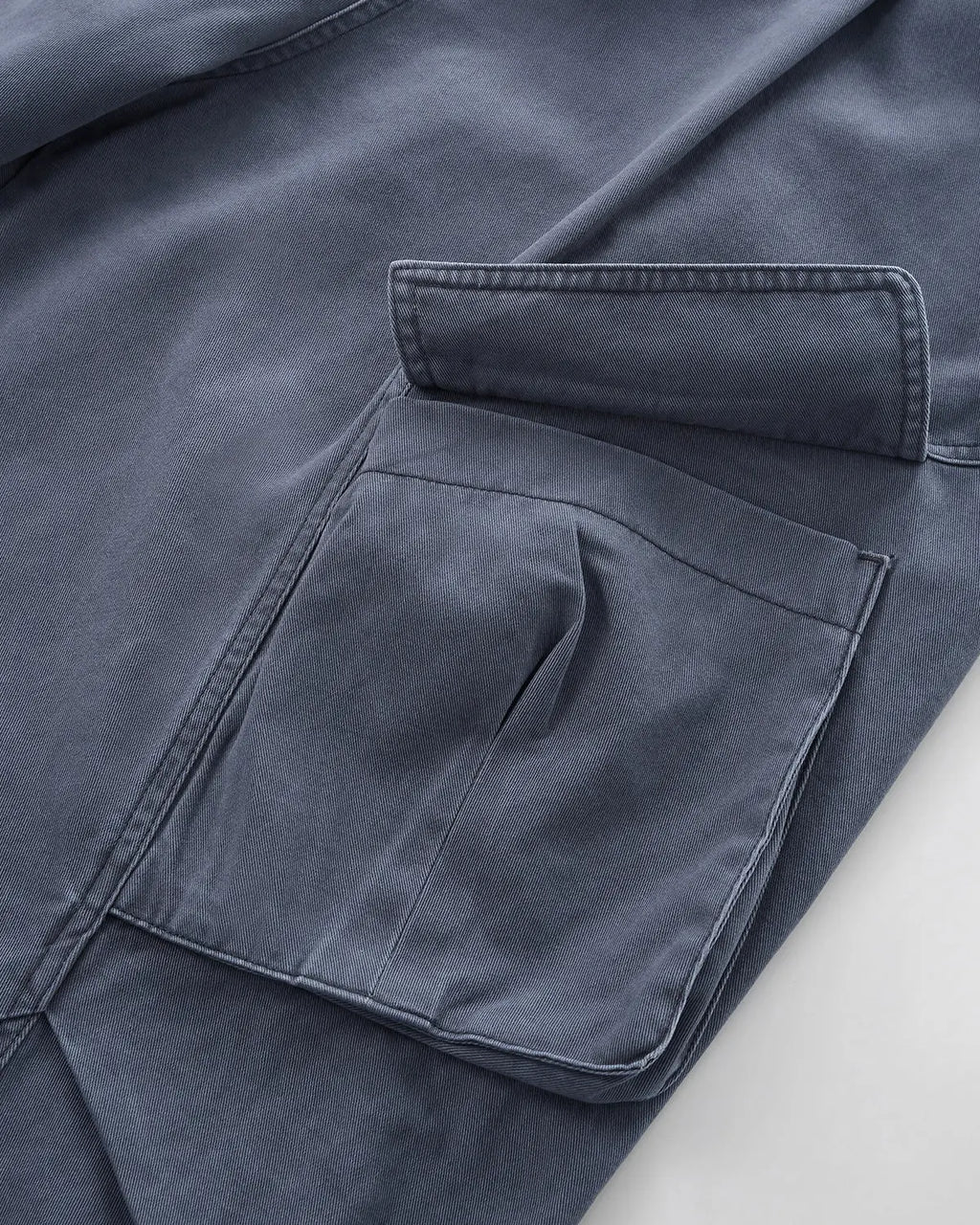 Baggy cargo pants with multiple pockets from INFLATION Streetwear, featuring a relaxed fit and utilitarian design.