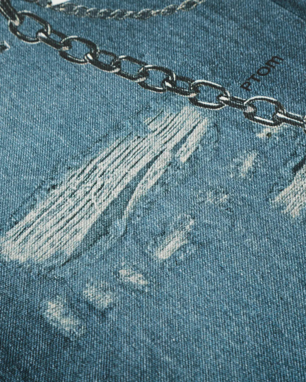 3D print chain barrel jeans by INFLATION featuring detailed chain embroidery and streetwear style, worn on a model.