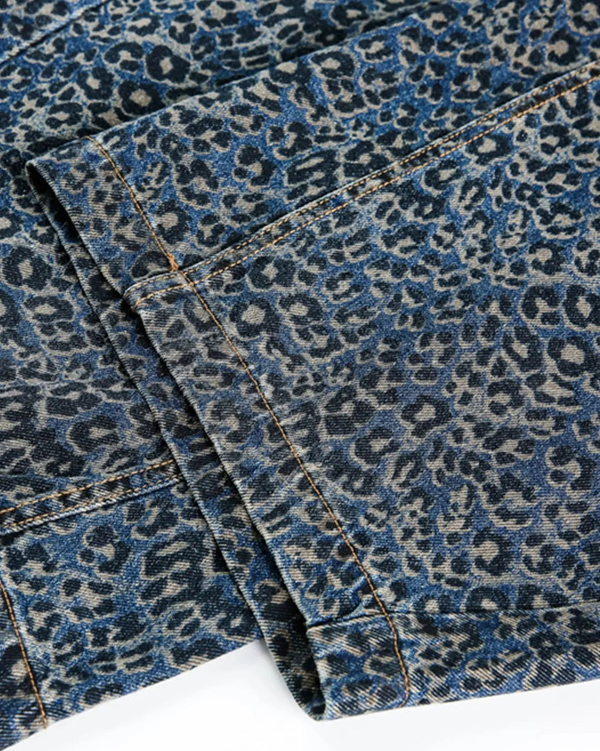 Vintage leopard print barrel jeans from INFLATION Streetwear, showing the high-waisted fit and bold leopard pattern in this image.