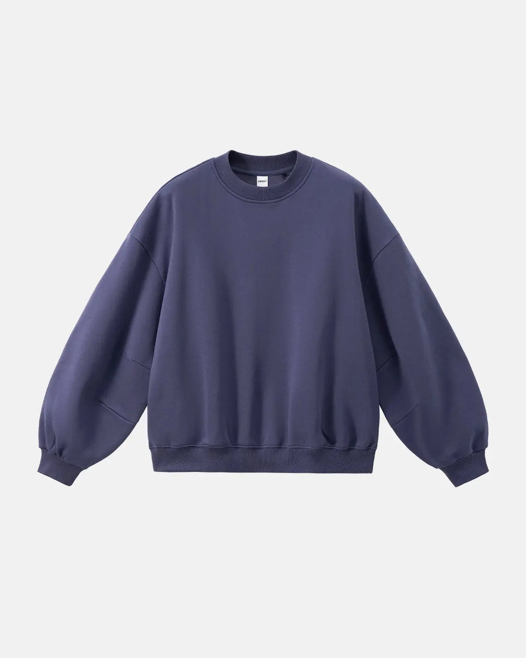Blank comfy crewneck sweatshirt from Inflation Streetwear, shown in a neutral color, casual fit with ribbed cuffs and neckline.