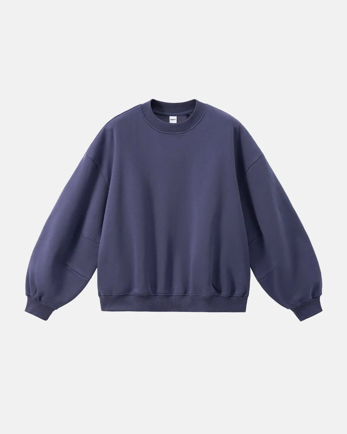 Blank comfy crewneck sweatshirt from Inflation Streetwear, shown in a neutral color, casual fit with ribbed cuffs and neckline.