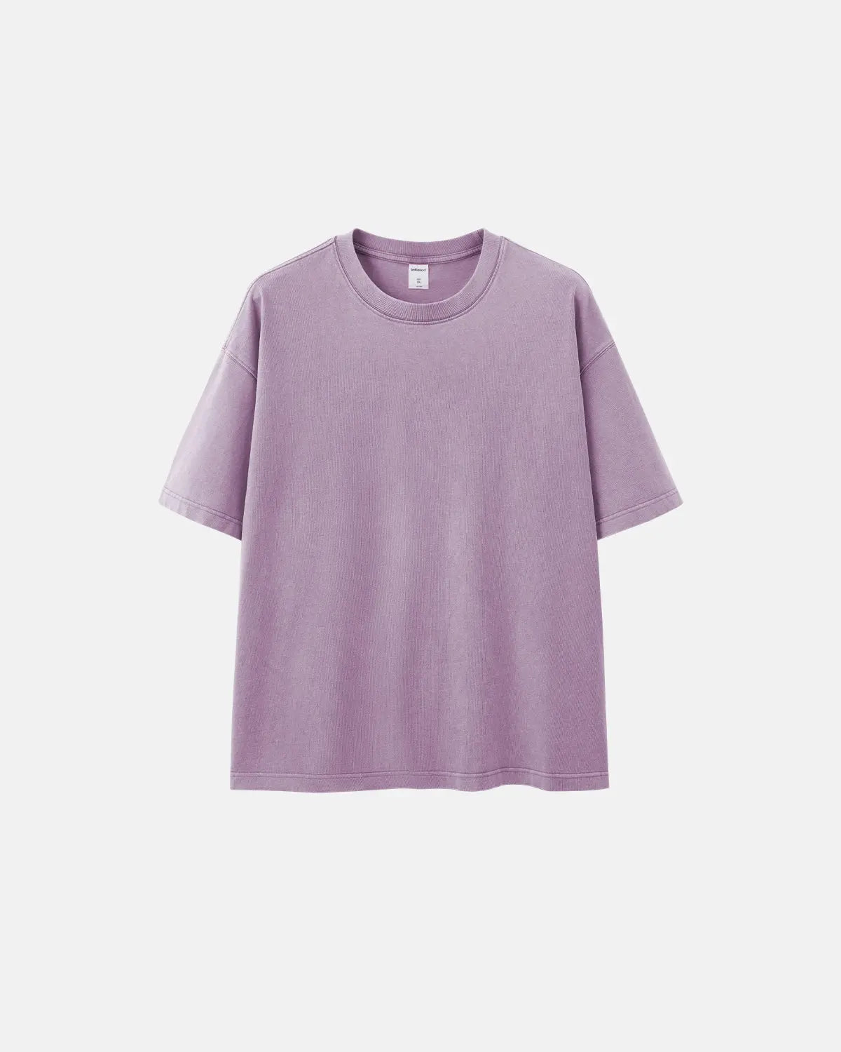 Inflation Heavyweight Oversized Washed T-shirt showing a relaxed fit and faded washed fabric in a streetwear style.