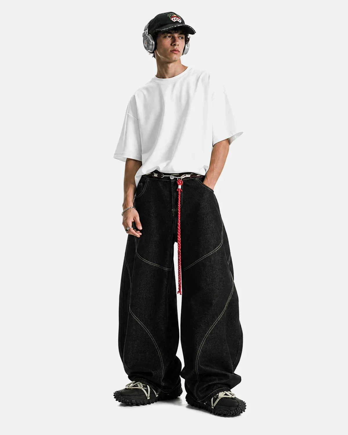 Acid wash baggy jeans with stitching details from INFLATION Streetwear, featuring a relaxed fit and distressed denim style.