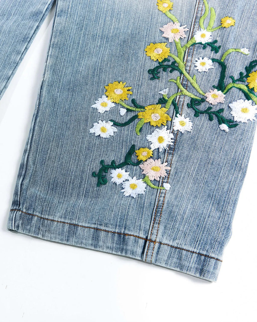 Inflation streetwear embroidery bamboo weave baggy jeans, casual pants with relaxed fit and unique woven fabric detail.